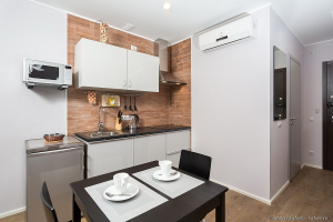 Фото Зона кухни и столовой в интерьере Авеню Апарт. Фотосъемка недвижимости. Фотограф Дмитрий Фуфаев.