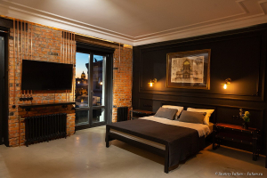 Зона спальни в квартире - студии. Фотограф Дмитрий Фуфаев.