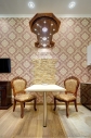 Мини-кухня, мини-столовая с камином в номере отеля. Фотосъемка интерьеров Дмитрий Фуфаев.